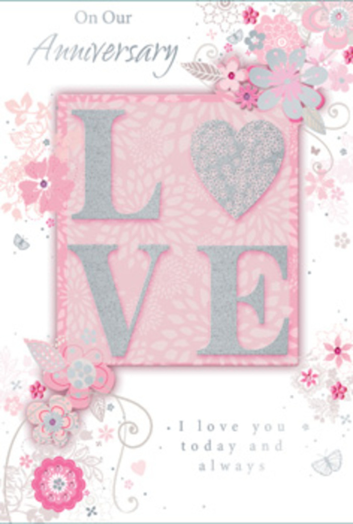 Opening this anniversary card feels like stepping into a softly lit room in Kingston upon Thames where love is quietly, steadfastly cherished. The central motif is the word LOVE, set in prominent letters that are lightly embossed and coated with a frosted glitter finish. The texture suggests a gentle roughness under the fingertips, much like the fine grain of a decorative ribbon tied around an anniversary bouquet. These letters are tinted in blush pink tones, offset against a creamy, pastel pink backdrop that glows subtly, echoing the delicate hues seen in spring blossoms along the riverside walk. Around the edges and sweeping in from the corners, hand-drawn blooms and airy sprays of foliage drift as if floating on a breeze. Their shades of pink, lilac, ivory, and soft grey mingle effortlessly, resembling a mix of roses and wildflowers that might be arranged by a local florist near Kingston upon Thames' historic Market Place. The illustrations include fine filigree lines, slender leaves, and dainty, almost-hidden butterflies that add a hint of movement and the gentle flutter of affection. Every curve and line feels thoughtfully placed, like the balance of flowers and greenery in a well-designed vase. Nestled within the design, the phrase I love you today and always is printed in understated, graceful type, leaving plenty of breathing space so the words can resonate. The entire card reads as a quiet, heartfelt tribute to enduring love-much like a hand-tied bouquet in paper form, suited to couples in Kingston upon Thames who value both timeless romance and everyday kindness.